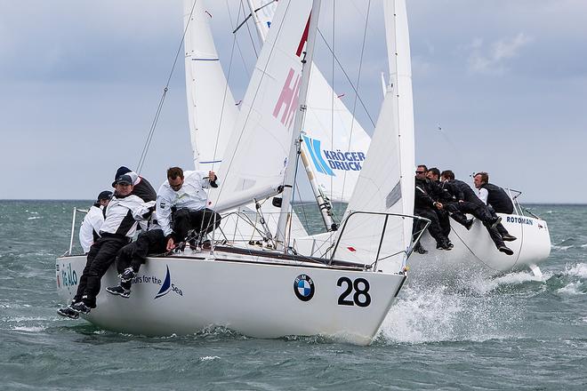 Tim Healy (left) and the crew of Helly Hansen from Sail Newport (USA) on their way to overall victory on the final day of the BMW J24 World Championships at Howth Yacht Club. ©  David Branigan / ISAF http://www.sailing.org